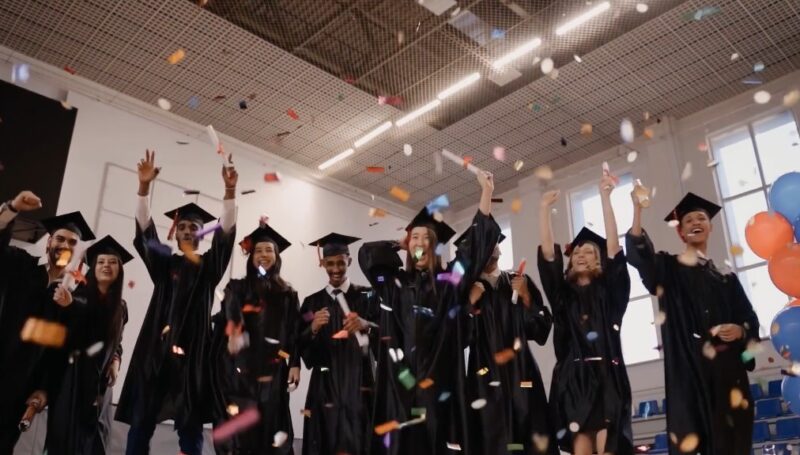 A group of graduating students celebrating